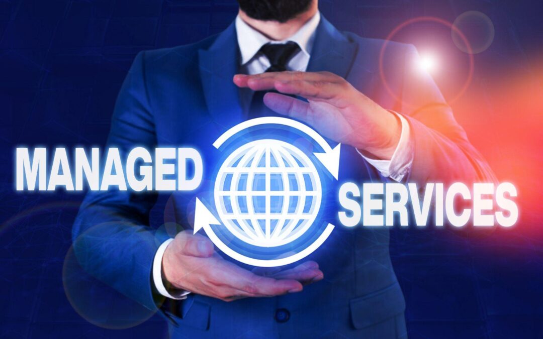 “Managed Services” written between the hands of a businessman.